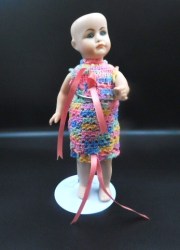 2 BISQUE PORCELAIN 7" & 8.5" K & R REPRODUCTION DOLLS, CROCHET DRESSES